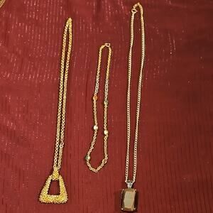 3 Assorted Gold Necklaces with Textured and Smooth Pendants